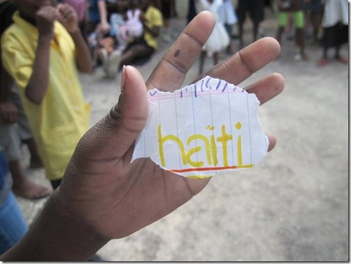 Kid_Holding_Haiti_Piece_of_Paper_in_Hand