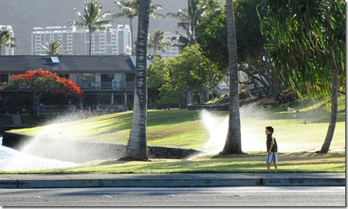 Boy and Sprinklers